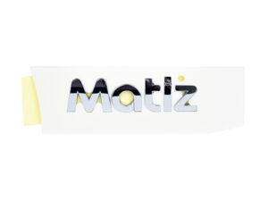 035-0677-01 EMBLEMA CAJUELA CV MATIZ 05-15 CROMADO ORIGINAL