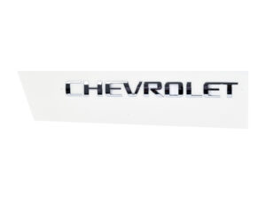 035-0679-01 EMBLEMA CAJUELA CV TRAX 13-18 CROMADO ORIGINAL